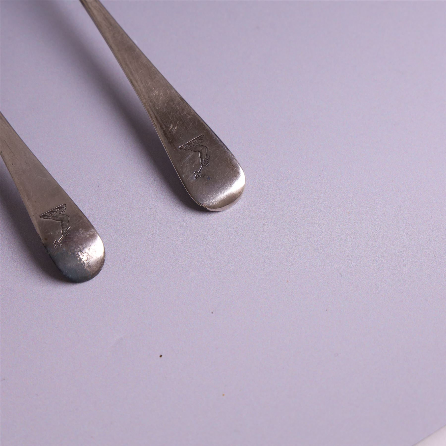 Two George III Old English pattern silver spoons, each engraved with arm and hammer crest to terminal, both hallmarked