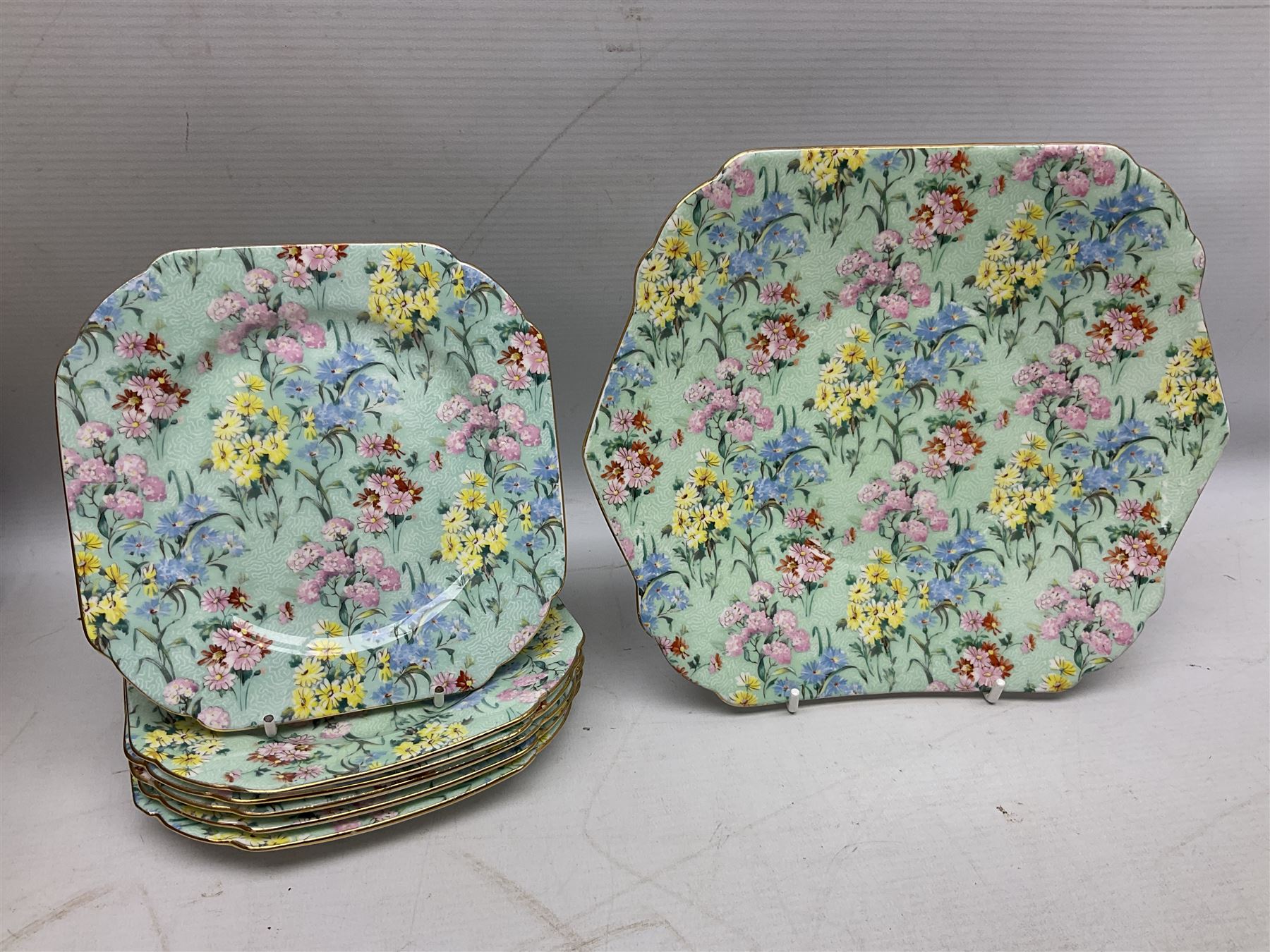 Shelley Melody pattern tea service for six, to include teapot, teapot stand, hot water jug, milk jug, covered sucrier, teacups and saucers, cake plates etc (31)