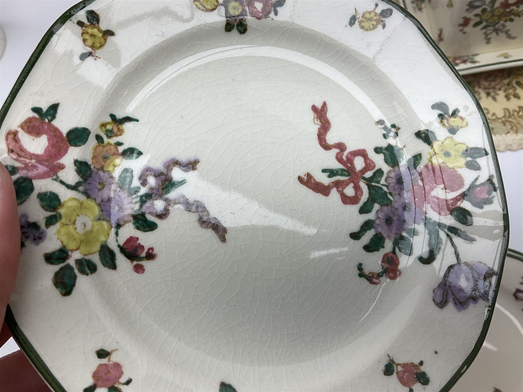 Royal Doulton part dinner service in Old Leeds Sprays pattern,  to include cheese dome, teapot and stand, egg cups etc, together with a selection of floral doilies.  