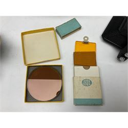 Arriflex 16SB camera body, serial no. 1784, with ' Carl Zeiss Distagon 1:2 f=8mm' lens, serial number 3860224, 'Carl Zeiss Jean Tessar 2/16' lens, serial no 3624355, camera pistol grip and other accessories, in fitted hard case