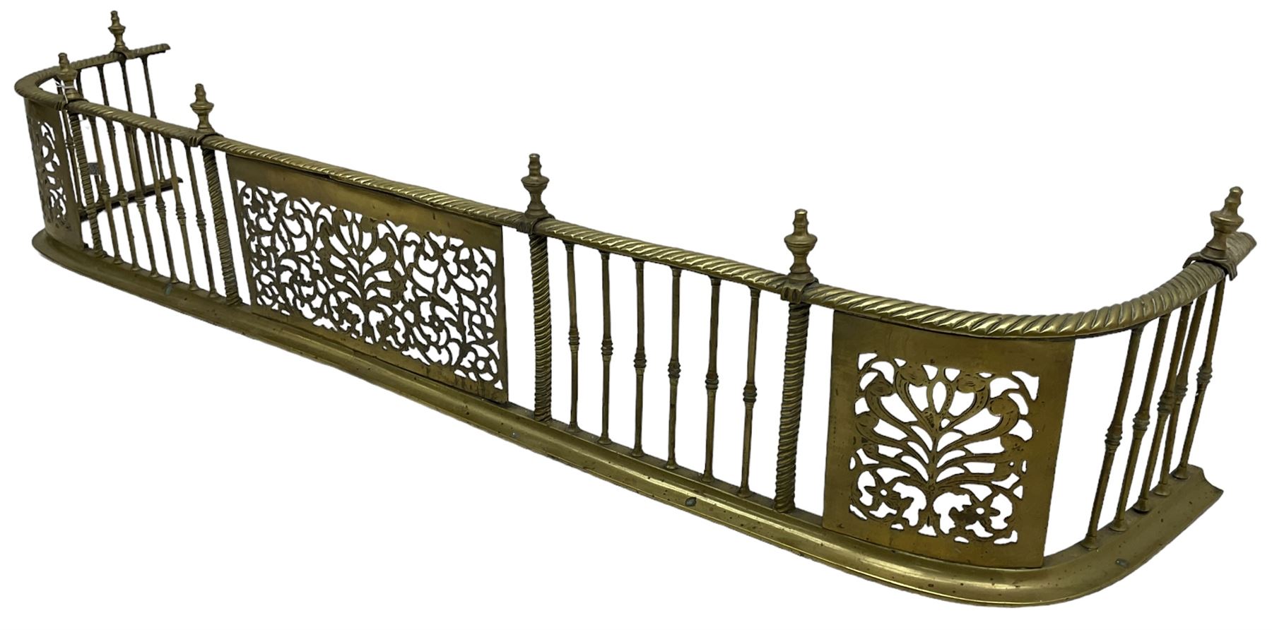 Early 19th century Irish brass D-shaped brass fender, twist borders and balustrade supports, central pierced frieze panel decorated with scrolling foliage and central anthemion motif  