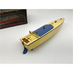 A boxed Hornby clockwork Speed Boat in cream and blue. 
