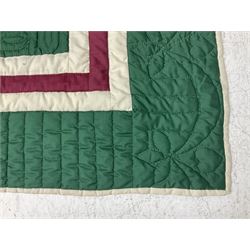 20th century quilt, with repetitive ship design to the centre within a cream red and green boarder, 227cm x 222cm