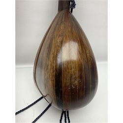 Late 19th/early 20th century Italian lute back mandolin with segmented back and spruce top; bears maker's label for Pietro Tonelli Napoli; together with a mandolin instruction booklet and a folding music stand L60.5cm