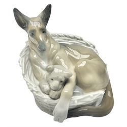 Lladro figure group, German Shepard with Pup, modelled as a dog and puppy in a basket, no. 4731, with printed mark beneath, H20cm