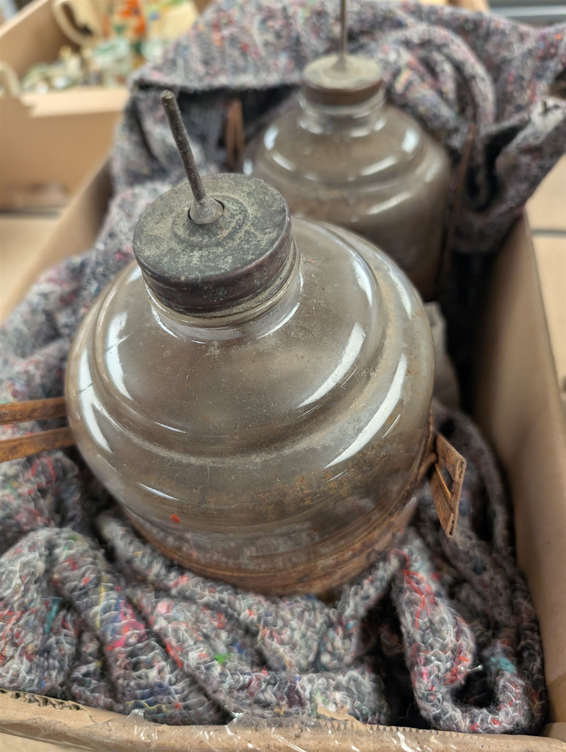 Mid 20th century Rippingilles Fyrside heater, painted in blue and white finish, with two empty glass paraffin bottles