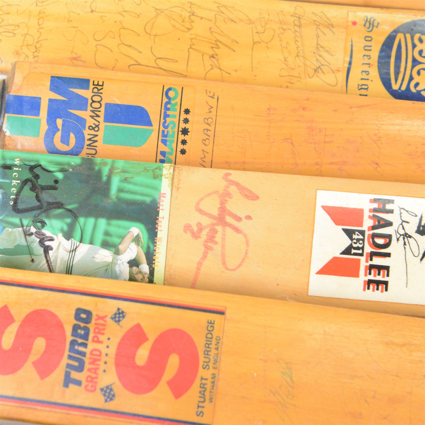 Signed International cricket memorabilia, comprising Alan Donald signed Kookaburra Commander cricket ball, wide brimmed hat signed by Darren Sammy and other West Indies players and a collection of signed miniature cricket bats, each with signatures of International cricket players including Brian Lara, Grant Flower, Richard Hadlee, Zimbabwe vs Rest of World 1993, South Africa vs Presidents VI 1994, Eastern Province South Africa 1992 and South Africa Touring Side Scarborough 1994