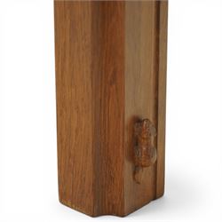 Beaverman - oak fire surround, moulded edge surrounding a rectangular aperture, with carved beaver signature, by Colin Almack of Sutton near Thirsk