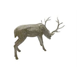 Silver finish stag statue, in grazing position 