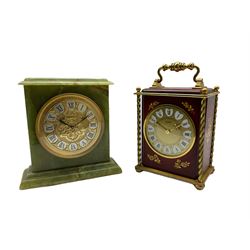 A Swiss 20th century eight-day mantle clock sounding the hours and half hours on an internal bell, with maroon panels and gilt metal decoration, twisted columns to the corners and carrying handle, gilt dial with roman numerals on a white background and minute track, gilded ornamental hands within a convex glass, spring driven rear wound and set movement with integral keys.
With a second Swiss 20th century eight-day mantle clock in a green onyx case, with a decorative gilt dial, Roman numerals on a white background and steel arrow hands within a convex glass, sounding the hours and half hours on an internal bell, spring driven rear wound and set movement with integral keys.

