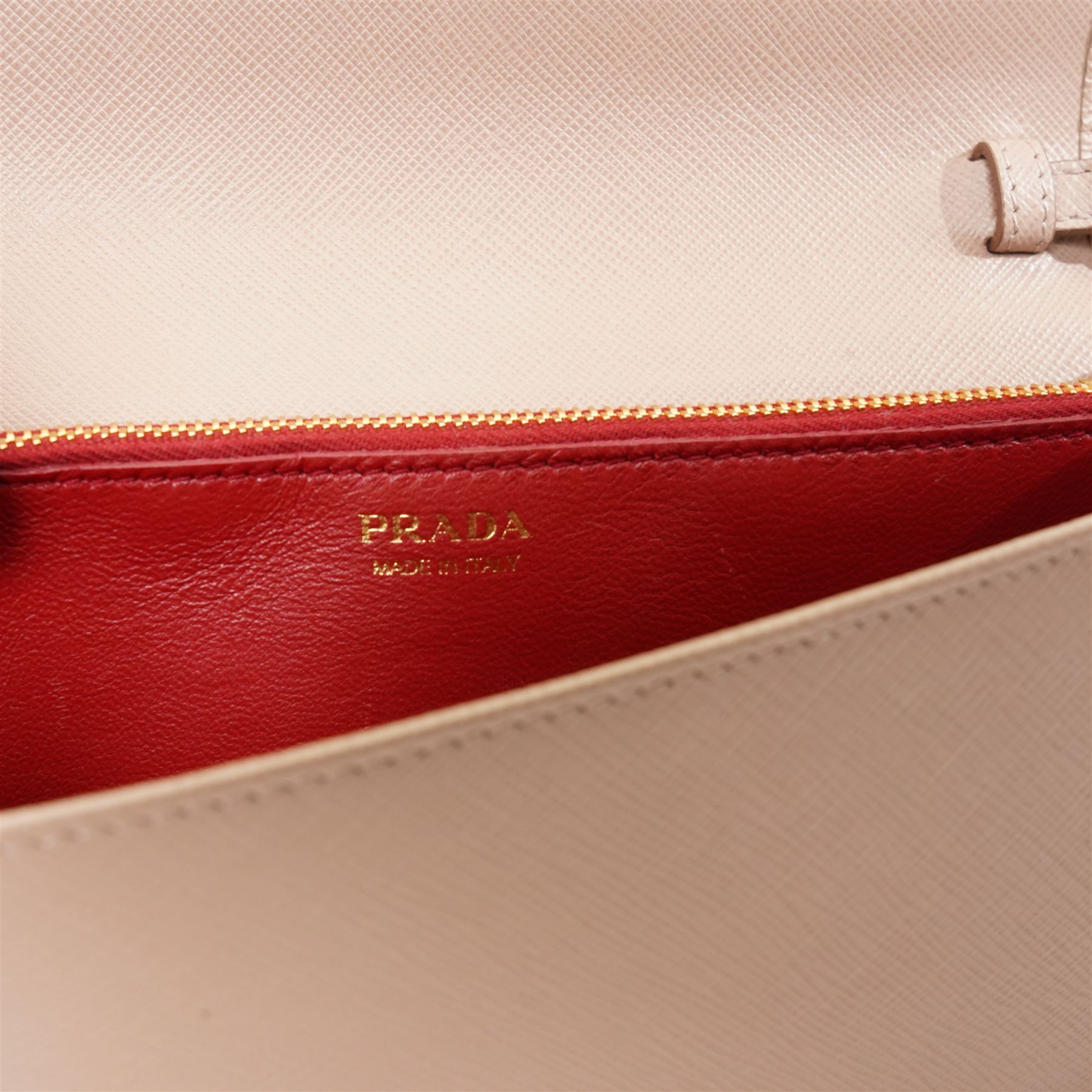 Prada - Saffiano Leather Mini Crossbody Bag, in structured nude-pink leather with detachable gold-tone chain shoulder or crossbody strap and hardware, Prada Milano raised logo, with crimson leather interior, unused with original dust bag