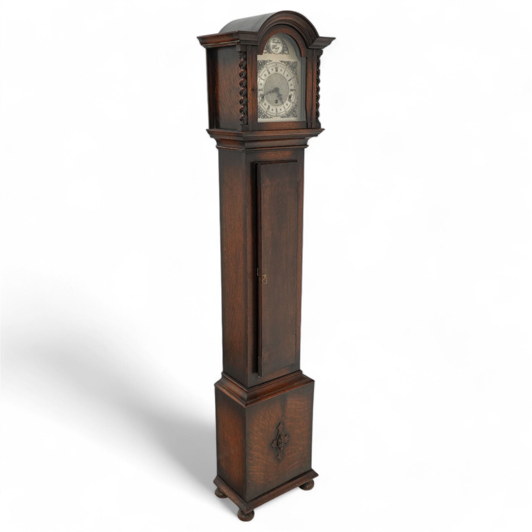 English 1950’s 8-day three train spring driven oak cased grandmother clock, with strike silent facility and pendulum.