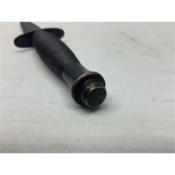 Third Pattern Commando Knife or Dagger with 17.5cm flattened diamond section blade and regulation black painted ribbed copper hilt with brass pommel nut; stamped William Rodgers Sheffield England to the cross-piece; in black painted brass mounted leather scabbard L34.5cm overall