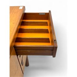 White & Newton - mid-20th century teak sideboard, rectangular top with raised back over fall-front storage compartment, double cupboard and three drawers, raised on cylindrical supports