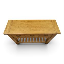 Contemporary golden ash and oak side table, rectangular top fitted with three drawers with swan-neck handles, on square supports united by slatted under-tier