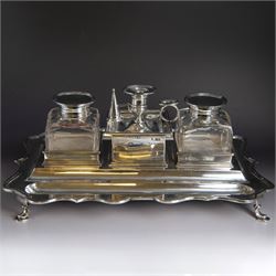 Edwardian silver desk stand, the stand of elongated octagonal form with shaped rim and upo...
