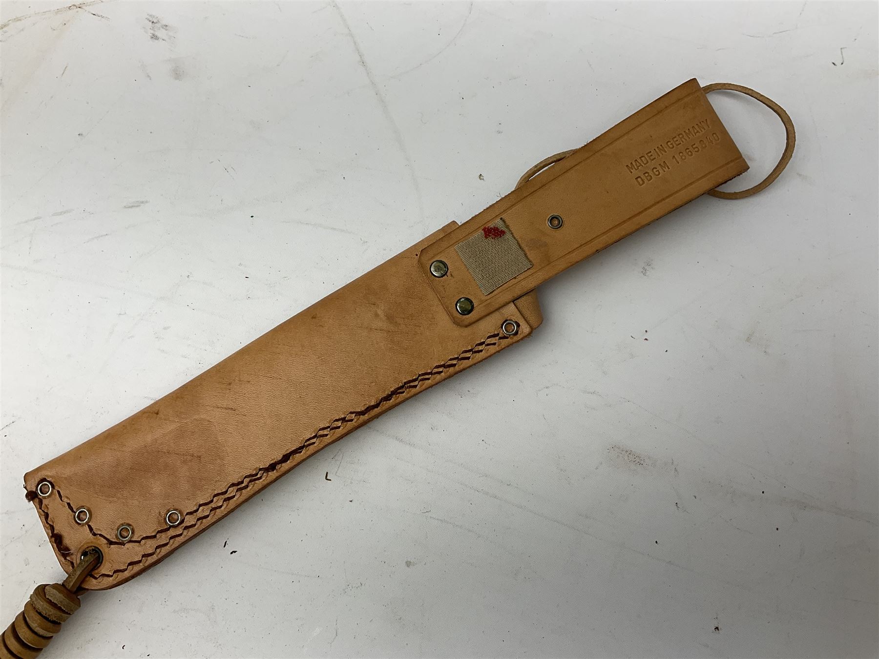German Original Puma-Bowie knife, with maker's name and number 6396 to the 16.5cm blade, stamped number 73373 to the guard, antler grip, in original hard plastic case with brown leather sheath, also marked Puma