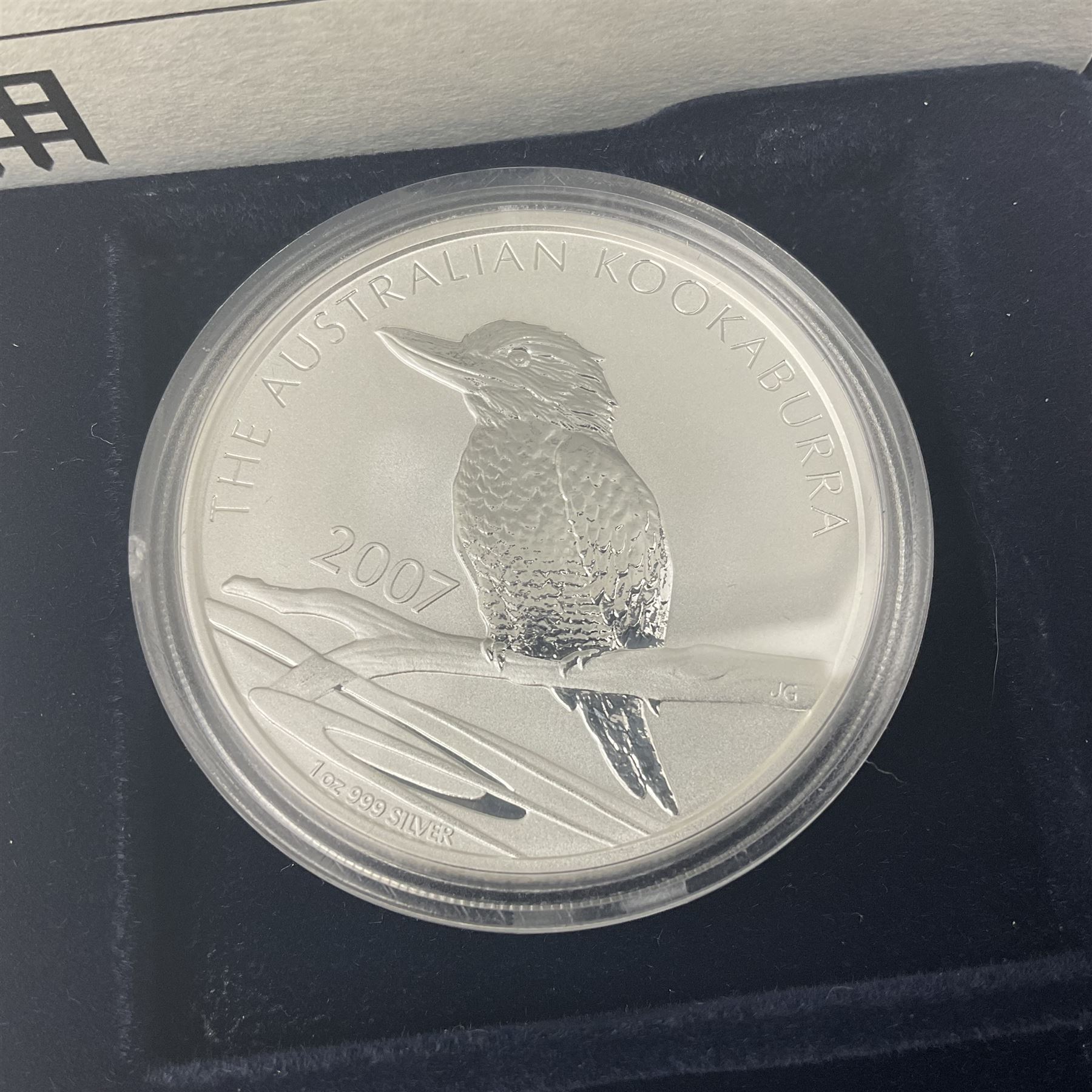 Four one ounce fine silver coins, forming 'The 2007 Famous World Silver Coin Collection', comprising United States eagle, Australian kookaburra, Chinese panda and Canadian maple leaf, cased with Westminster certificate 