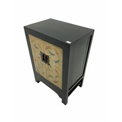 Oriental ebonised and painted two door cabinet, 