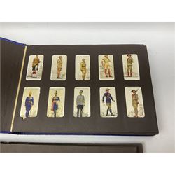 Four albums of cigarette cards, including Will's and Player's examples