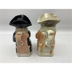19th century and later Toby jugs comprising Staffordshire Punch and Judy jugs, Victorian 'I am on the black list' jug, two jugs in the form of Toby with a jug of beer (5)