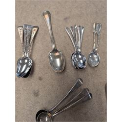 Collection of silver teaspoons, including souvenir and American silver examples, together with a silver handled fork and a mother of pearl handled silver knife, all stamped or hallmarked 