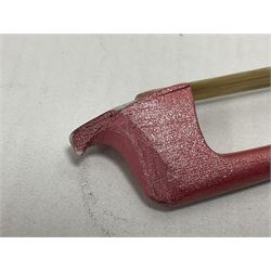 Zest full size pink violin, with a solid wood body and maple head, with matching pink bow and two further bows, in a hard case Length 60cm