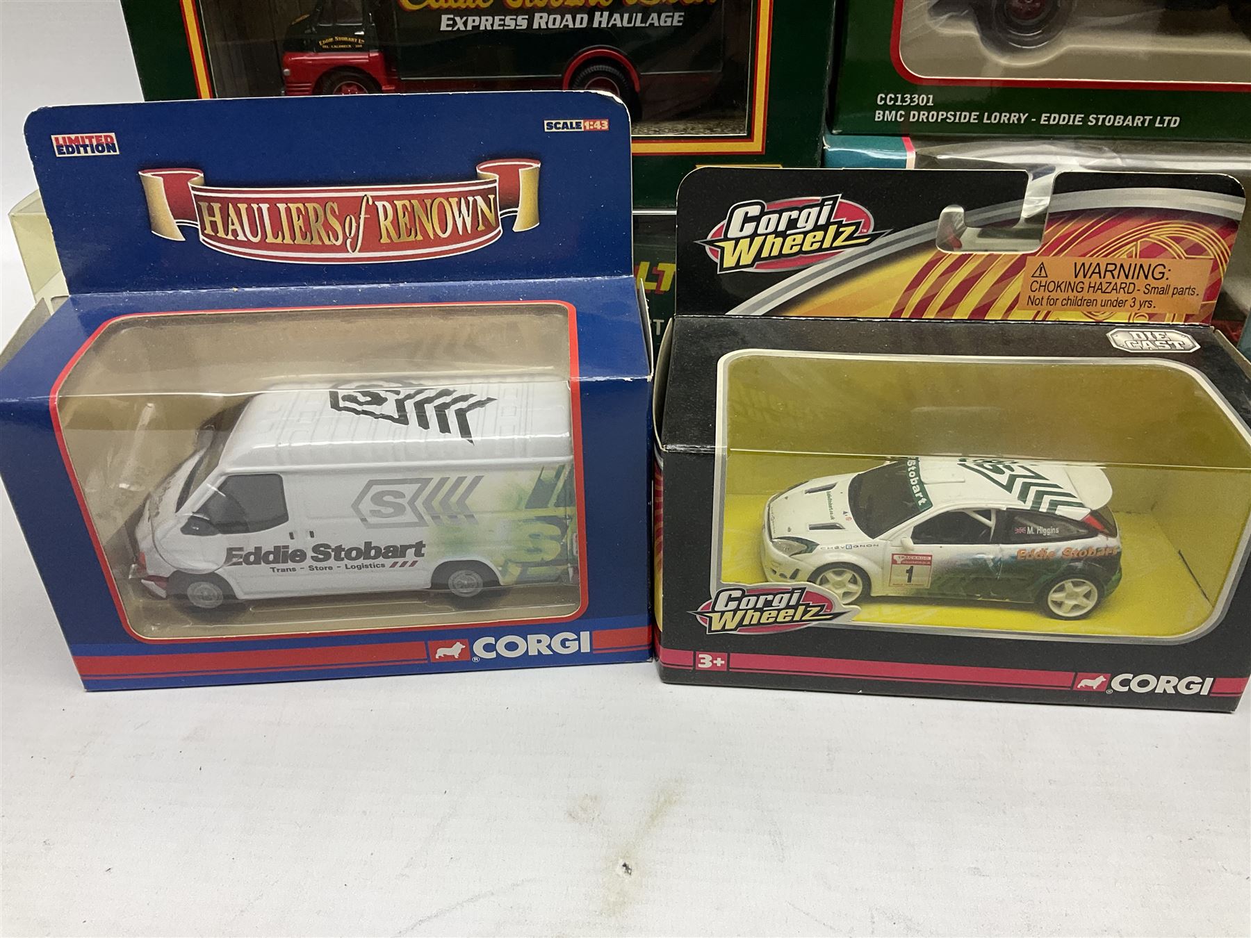 Corgi Eddie Stobart - thirteen various lorries, vans and cars including Reliant Regal, Minis, Land Rover etc; all boxed (13)