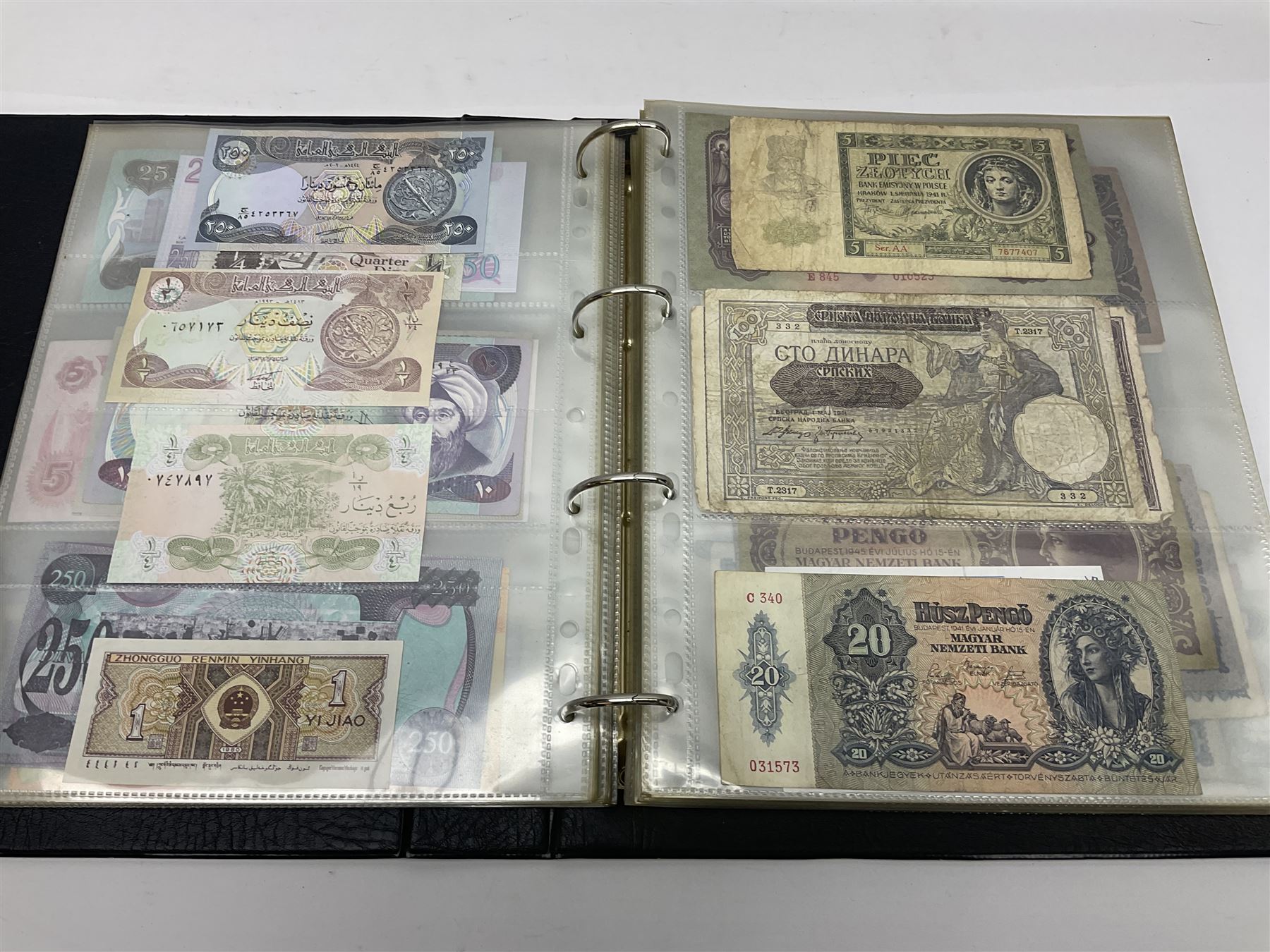 World and Great British banknotes to include Brazil, Canada, France, Germany, Ghana, Indonesia, Iraq, Hong Kong, Hungary, Japan, Vietnam, Zimbabwe, a collection of Chinese ‘Hell Money’, and quantity of ‘De La Rue Systems’ test notes, housed in ring binder and loose