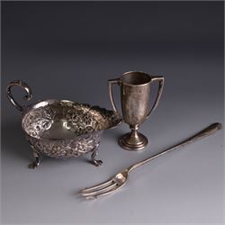 Victorian silver sauceboat, of typical form with embossed floral and foliate decoration, h...