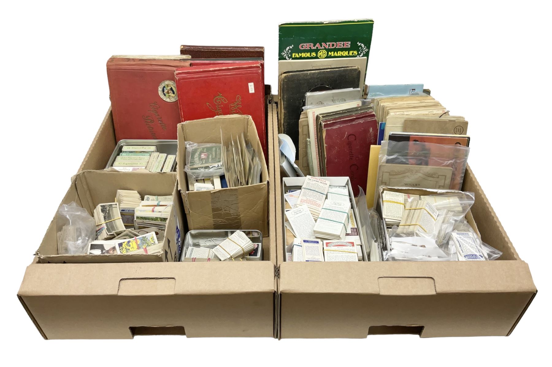 Quantity of cigarette and trade cards, housed in albums and loose, by W.D. & H.O. Wills, John Player & Sons etc, including cycling, garden hints, Britain's railways, dogs etc and various empty vintage cigarette card albums, in two boxes