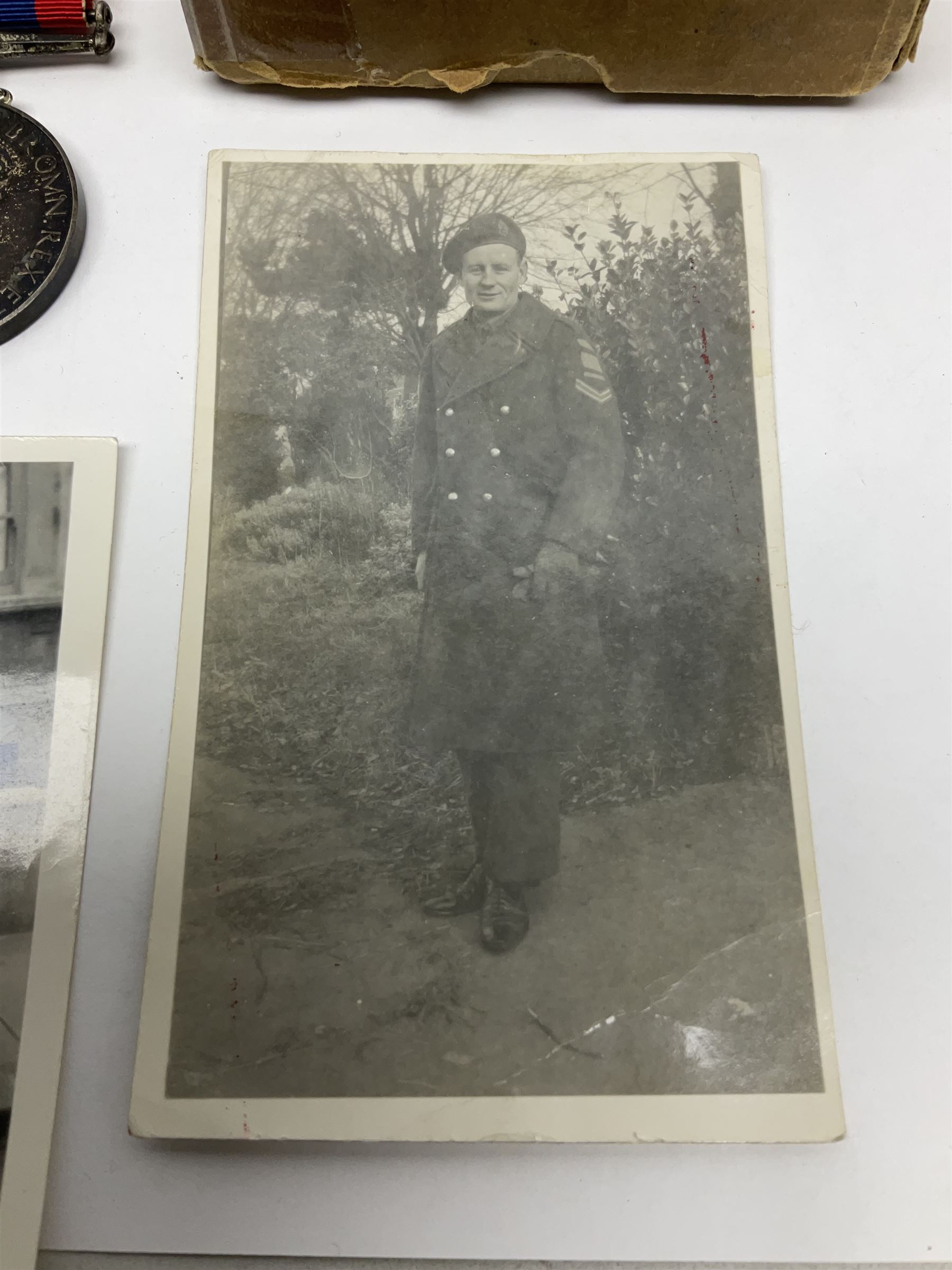 WW2 group of five medals comprising 1939-1945 War Medal, Defence Medal, 1939-1945 Star, France and Germany Star and Canadian Volunteer Service Medal; on wearing bar with ribbons; with a medal box and slip and three photographs