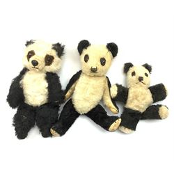 Two 1930s Chiltern panda bears, one with swivel jointed head, glass eyes, vertically stitched nose and mouth and jointed limbs H14