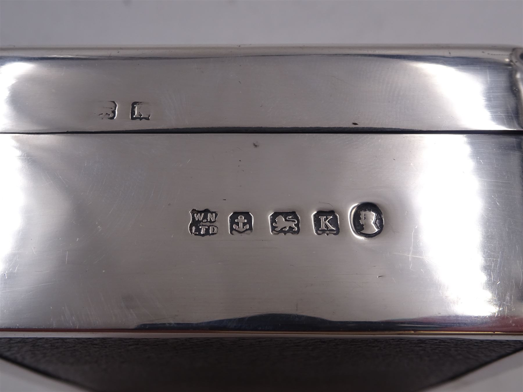 1930s silver mounted cigarette box, of square form, with engine turned decoration and blank rectangular panel to hinged cover, opening to reveal softwood lined interior, hallmarked William Neale & Son Ltd, Birmingham 1934, H3.8cm