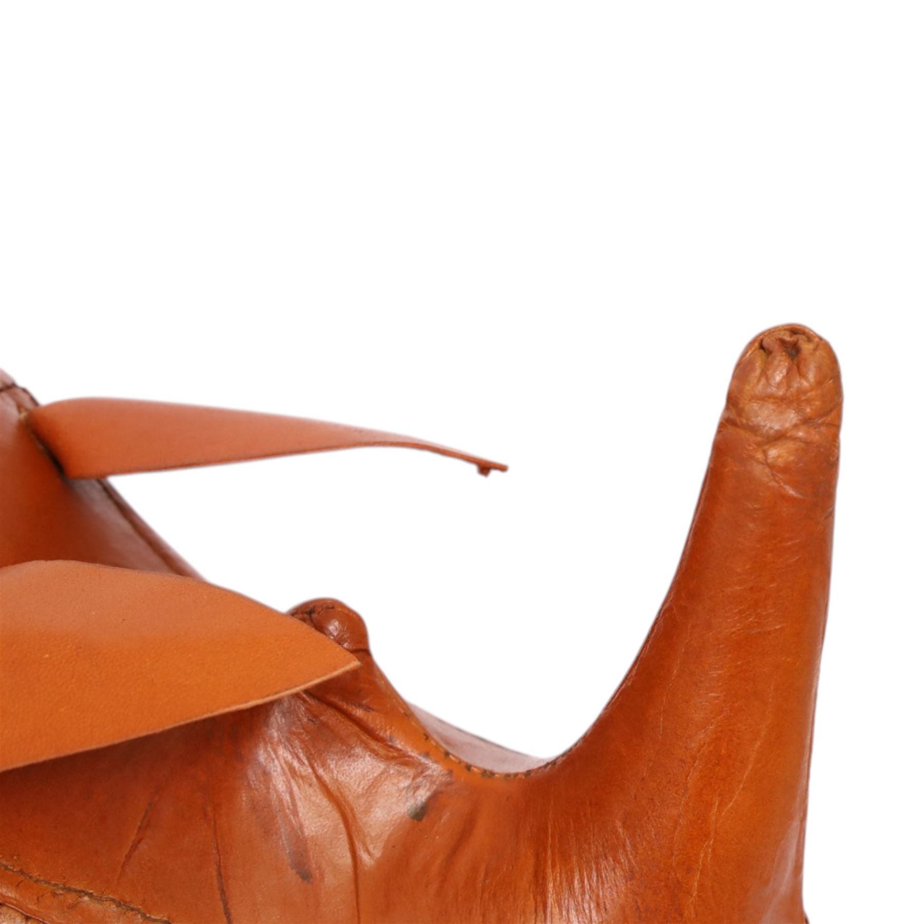 21st century leather rhino footstool, H40cm, L80cm 
