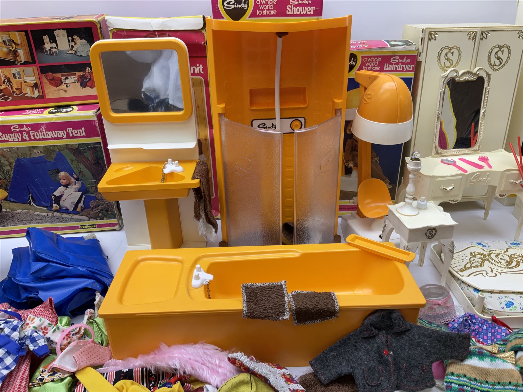 Sindy - Camping Buggy and Folding Tent, Bath, Shower, Washbasin unit and Hairdryer; all boxed; together with unboxed kitchen units, dining and bedroom furniture; and two bags of clothing and accessories