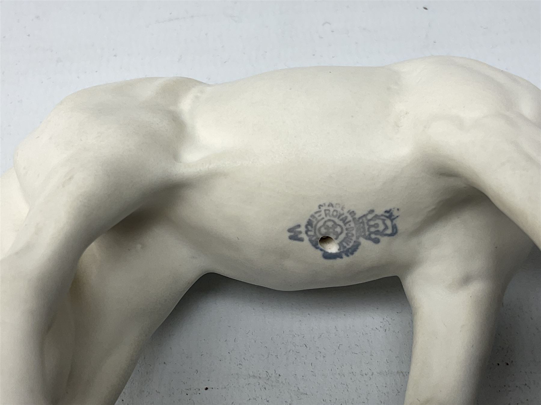 Collection of Beswick horses, including grey horse no.701, palomino foal no 836, grey stocky jogging mare no.855 etc, together two Royal Doulton horses, (8)