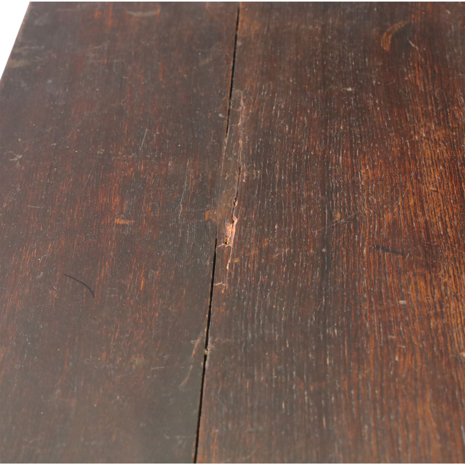 19th century oak cupboard cabinet, the moulded rectangular top above a deeply carved front carved with frieze of lunettes above a central panelled cupboard door with lozenge and foliate carving, flanked by vertical carved panels, upon turned legs with boarded lower shelf