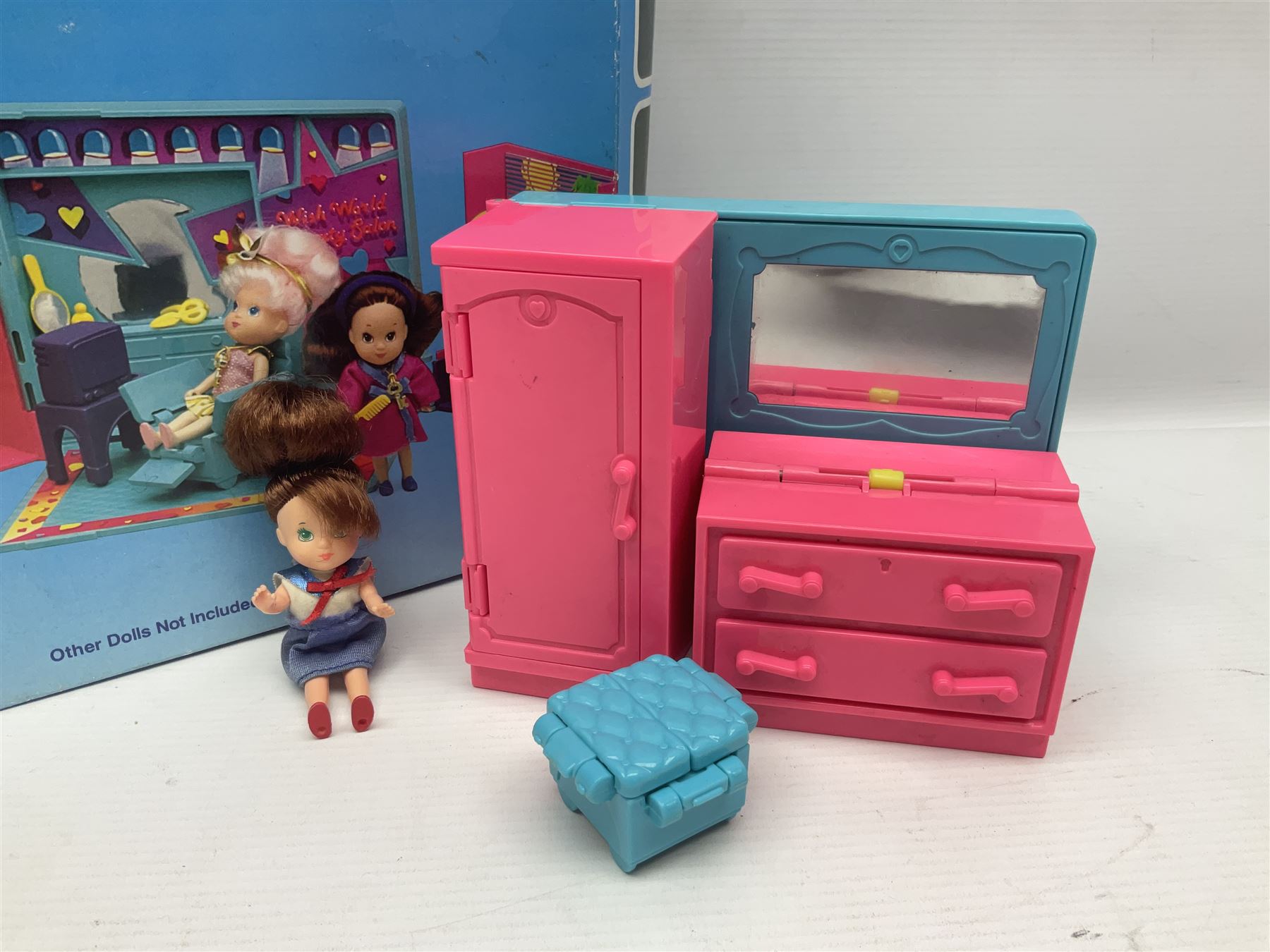 Wish World Kids - Eleven play sets comprising Treats ‘n Sweets Refrigerator, Grin ‘n Win TV, Sponge ‘n Plunge Bathtub, Socks ‘n Locks Dresser, Spice ‘n Slice Stove, Sleep ‘n Leap Bed, File ‘n Smile Desk, Blaze ‘n Braise Fireplace, Hear ‘n Cheer playset in Sponge ‘n Plunge box, two Read ‘n Speed Chair playsets in one box
