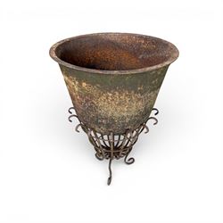 19th century cast iron bell cauldron, with associated wrought iron stand