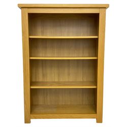 Oak open bookcase, fitted with three adjustable shelves