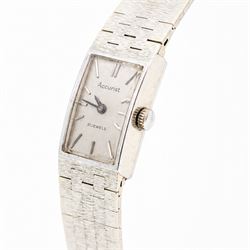 Accurist ladies 9ct white gold manual wind wristwatch, silvered dial with baton hour markers, on integral 9ct bracelet, London 1969