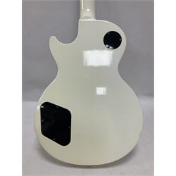 2010 Gibson Les Paul studio guitar, serial no101500537 in white finish with gold and pale green hardware, in Auden soft carry case, guitar L100cm