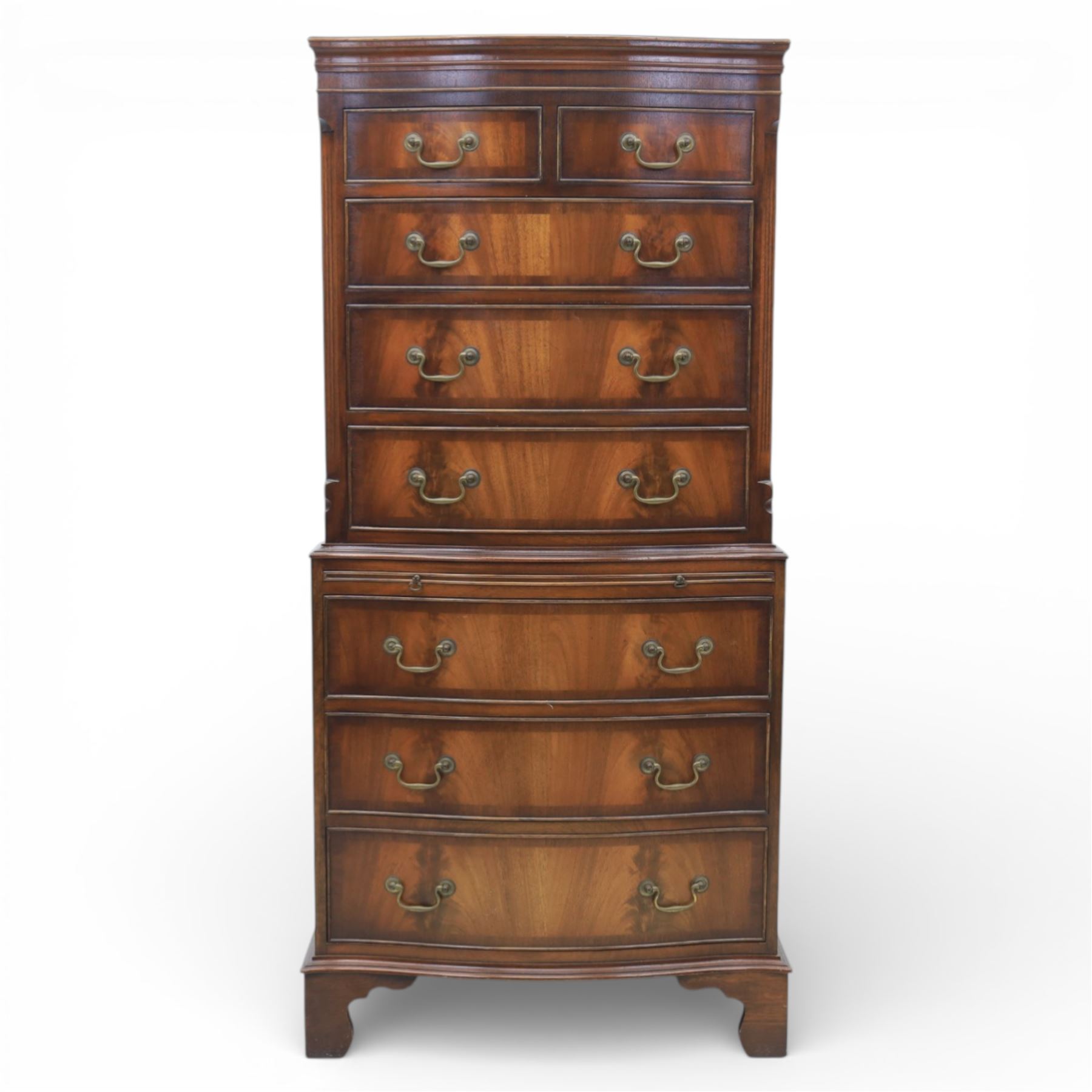 Reprodux - Georgian design mahogany serpentine chest-on-chest, top section with two over three drawer arrangement, flanked by chamfered edges, the lower fixed section, with slide above three drawers, raised on bracket feet  