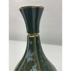 Royal Worcester vase of baluster form with floral decoration on a green ground H26cm