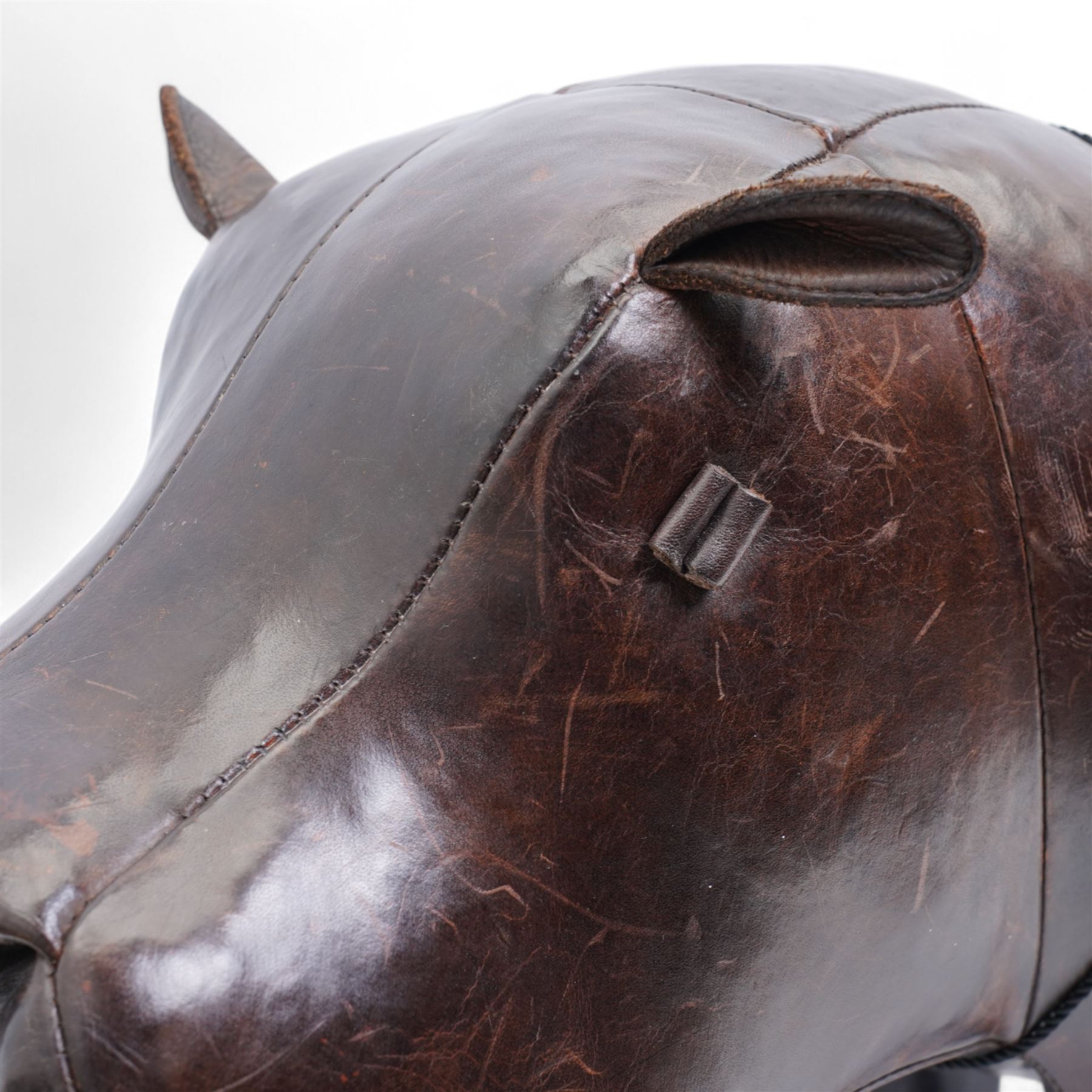 Omersa leather footstool in the form of hippopotamus, with silver 'The World of Thomas Sabo' charm collar, with original retail card tag, W80cm 