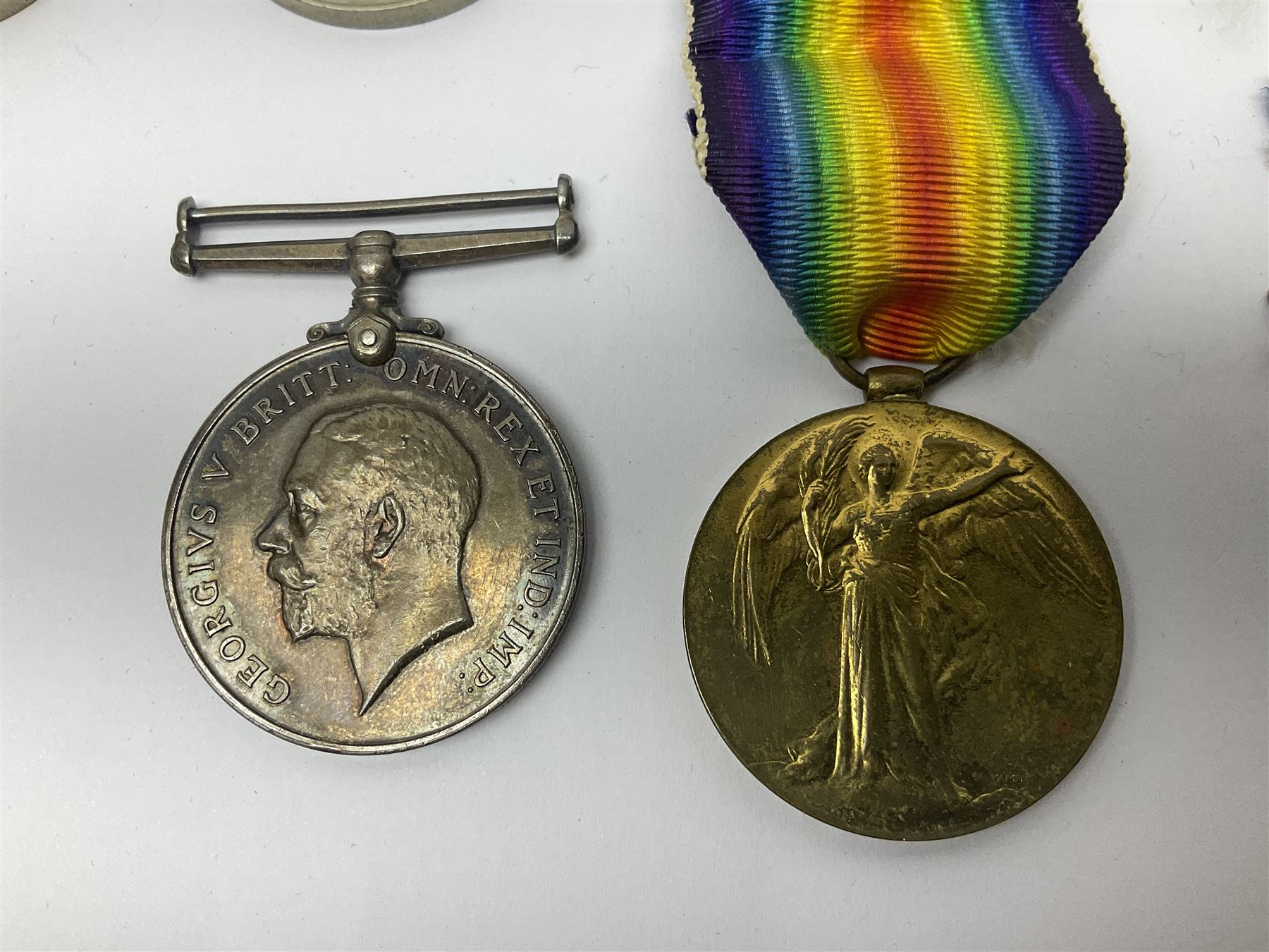 WWI pair of medals comprising British War Medal and Victory Medal awarded to 380807 Pte. W. Hayles Hamps. R.; Imperial Service Medal awarded to William Hayles; cased and boxed; WWII 1939-1945 War Medal and Defence Medal in issue box with slip; 1930s hallmarked silver football presentation fob etc
