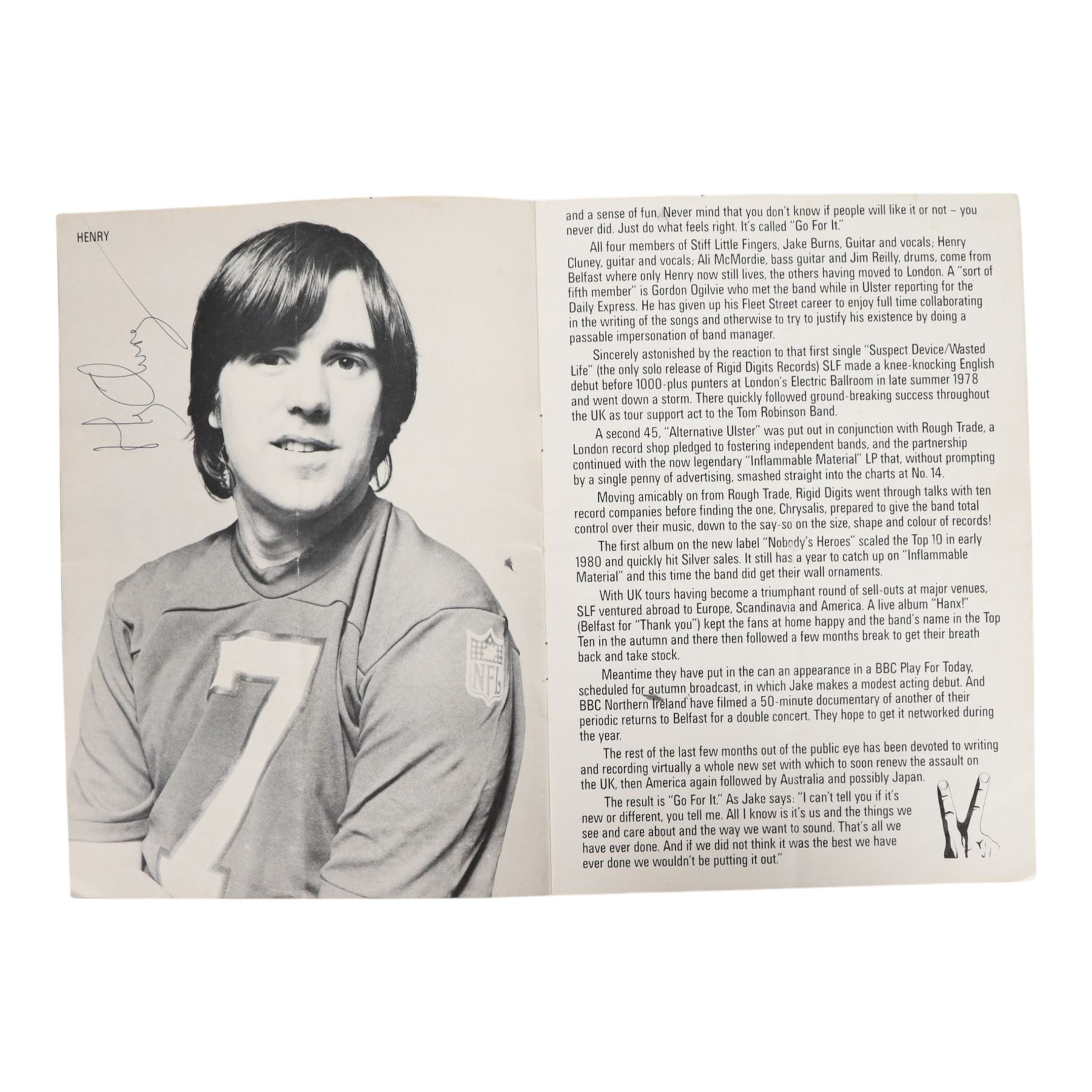 Signed Stiff Little Fingers promotional card, signed by four members of the band Jake Burns, Henry Cluney, Ali McMordie and Jim Reilly, two unsigned promotional cards,  'Go For It' 1981 tour programme and a collection of photographs from the gig