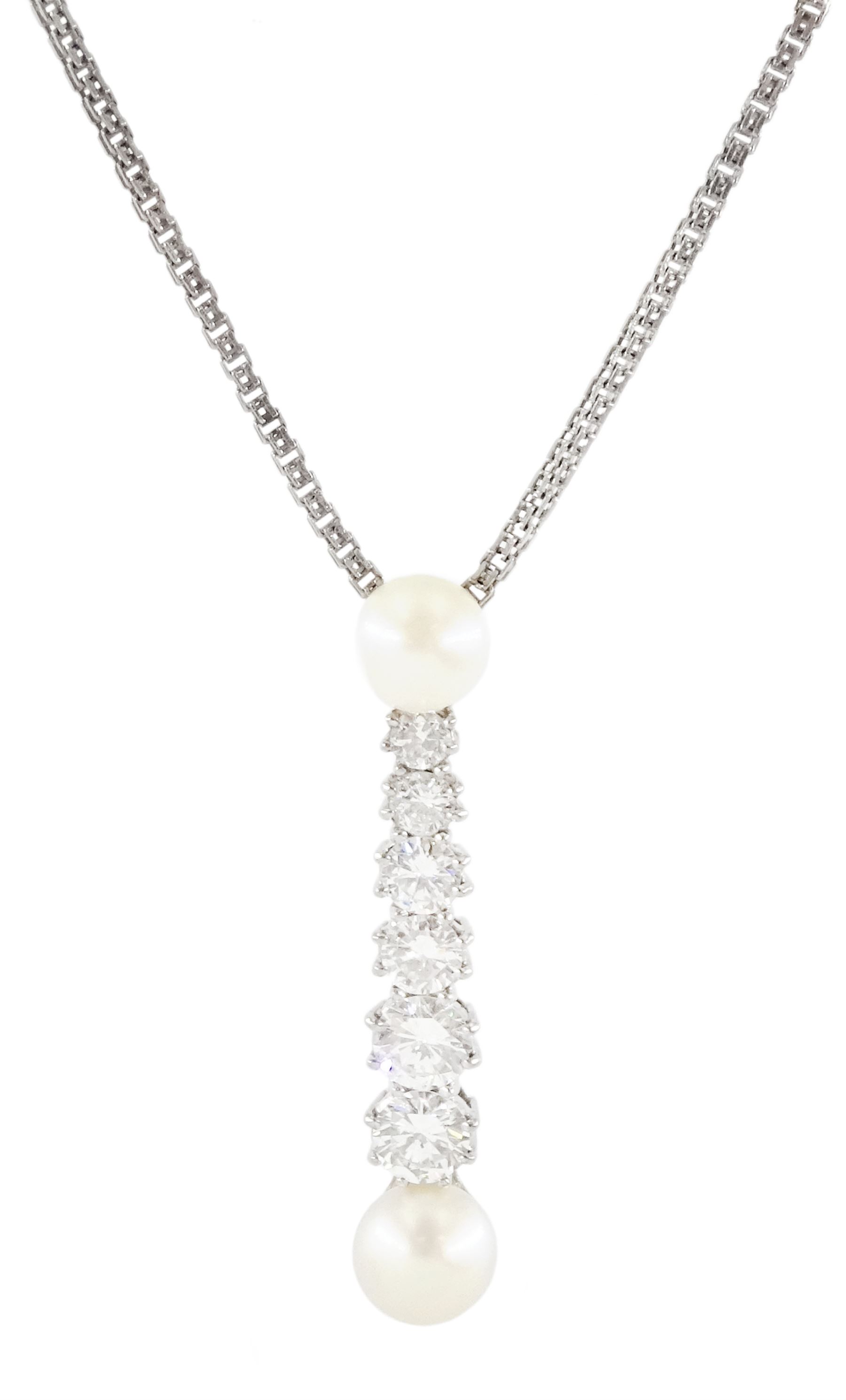 18ct white gold pearl and diamond pendant necklace, six graduating round brilliant cut diamonds set between two white cultured pearls, the largest two diamonds approx 0.55 carat each, total diamond weight approx 1.90 carat