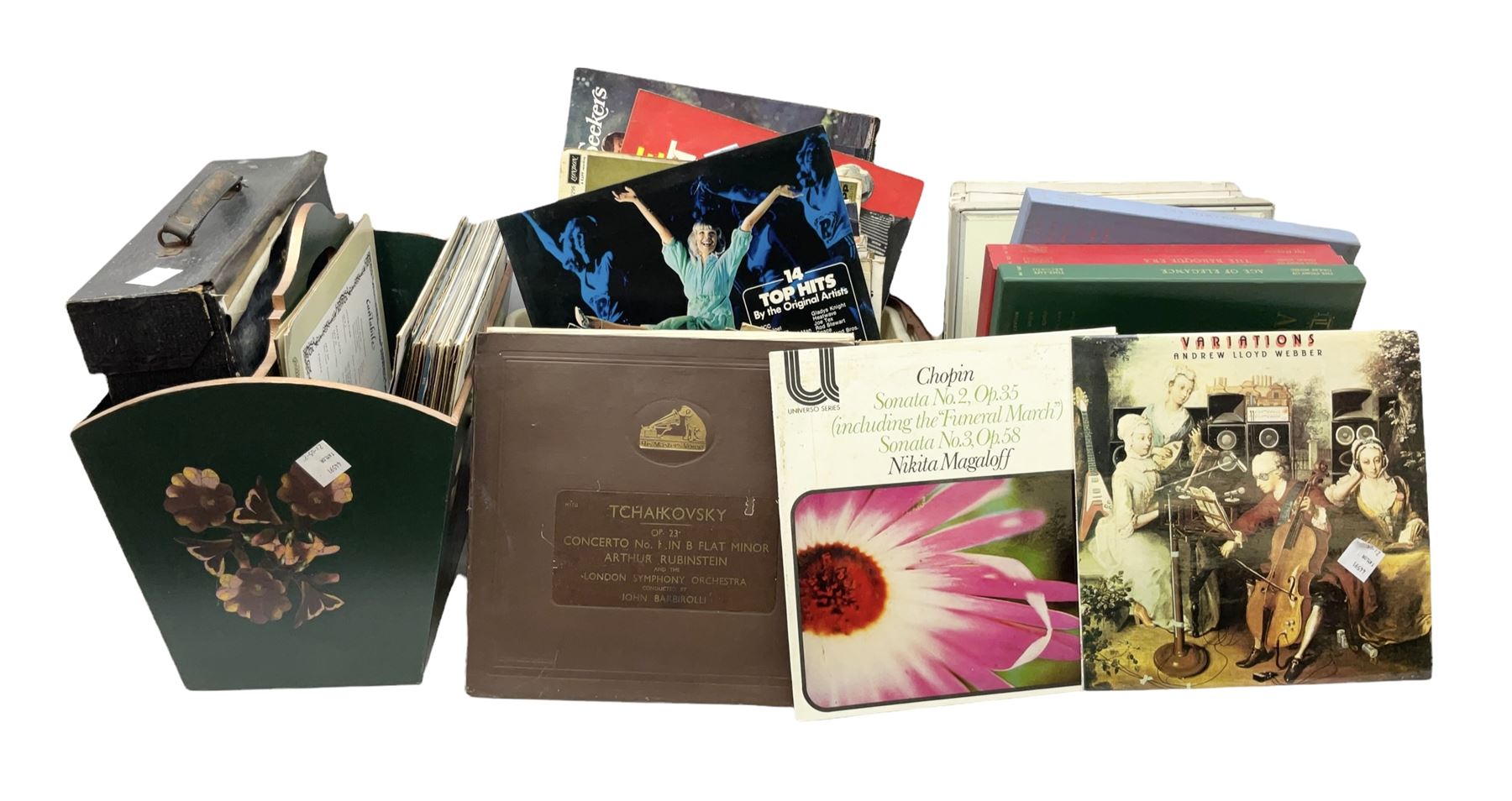 Wooden magazine rack, with floral detail, together with a collection of records, to include the box sets 'the Story of Great Music', 'Popmobility', Happy Holiday in Greece  etc, in three boxes 